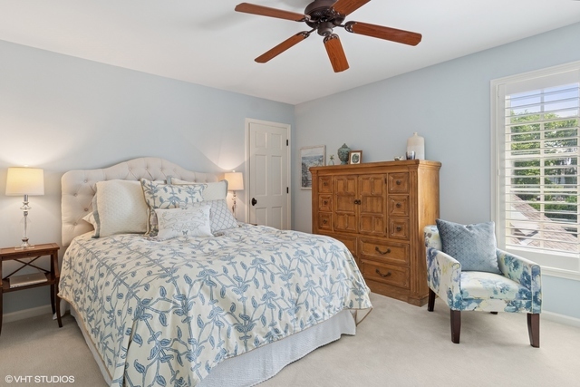 8S241 Dunham Drive Naperville, IL 60540 - Photo 14 of 27 a bedroom with a bed and furniture