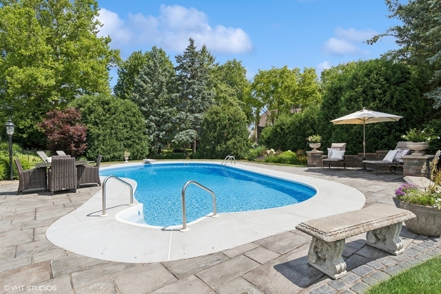 8S241 Dunham Drive Naperville, IL 60540 - Photo 24 of 27 a view of a patio with chairs and plants