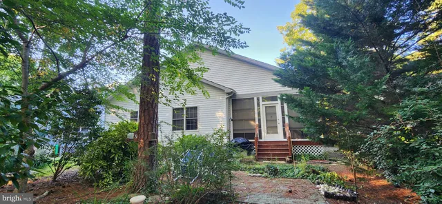a view of a house with balcony and garden