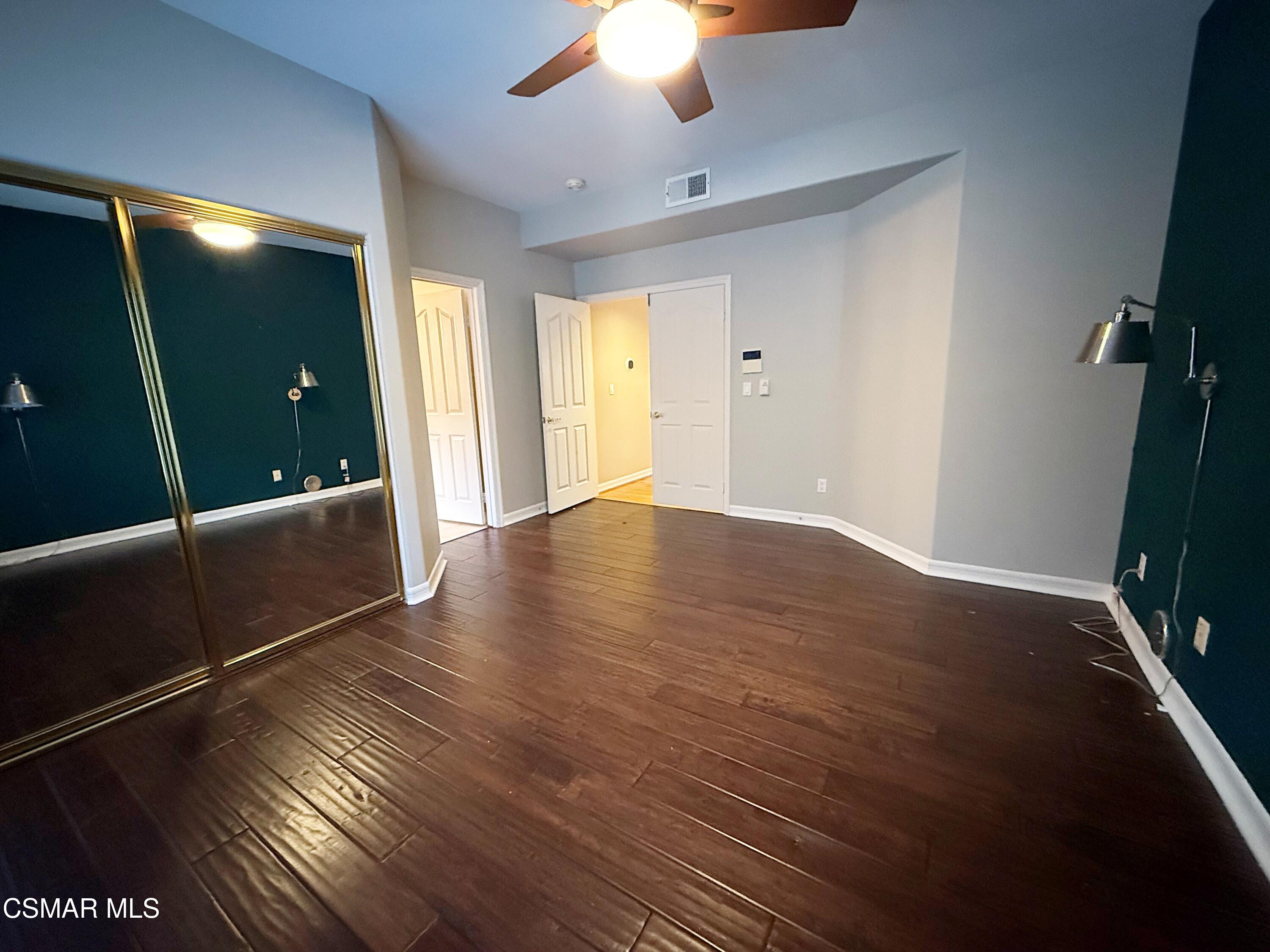 267 High Meadow Street Simi Valley, CA 93065 - Photo 16 of 36 wooden floor in an empty room with a window