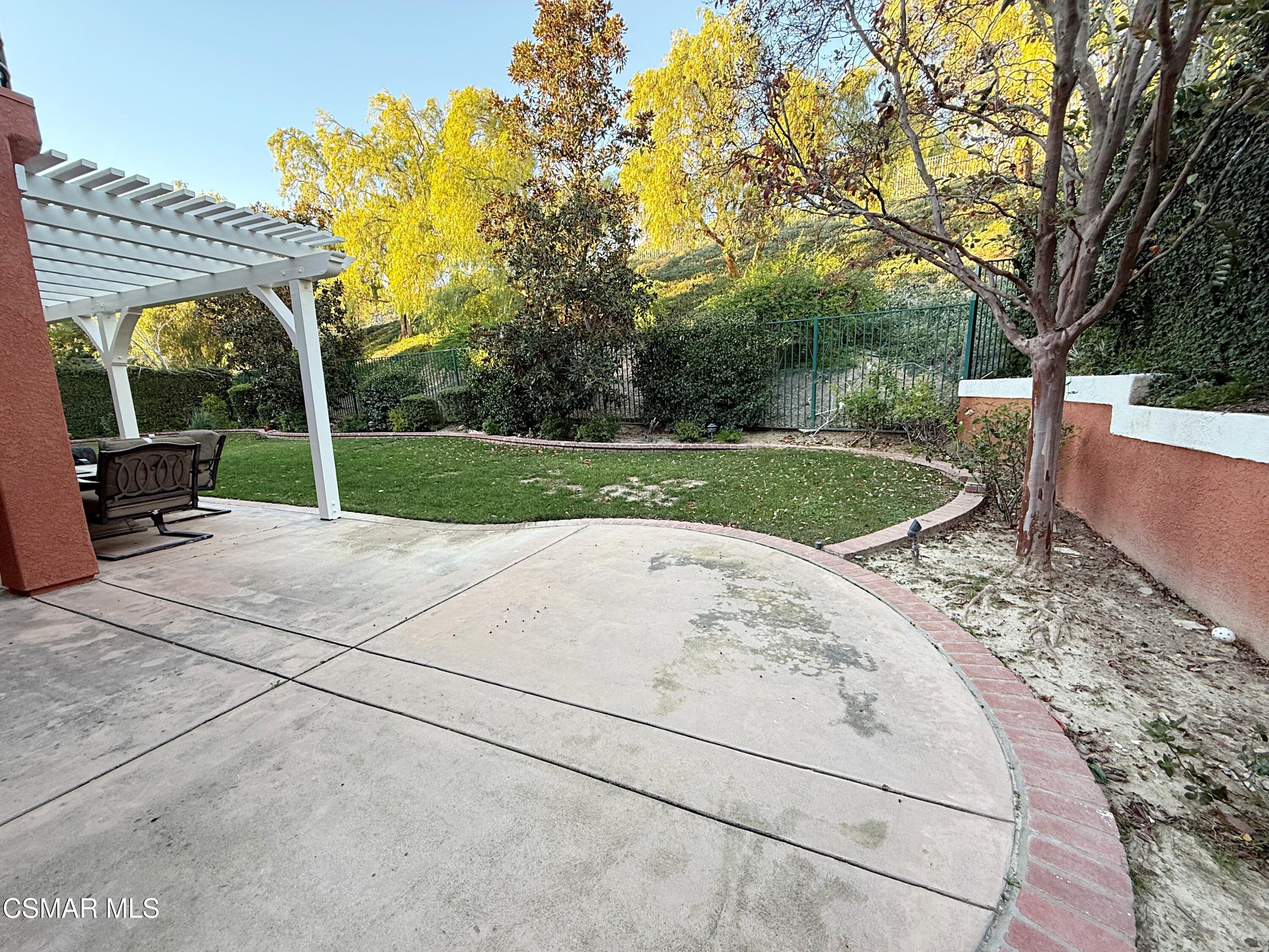 267 High Meadow Street Simi Valley, CA 93065 - Photo 35 of 36 a view of a backyard with large trees