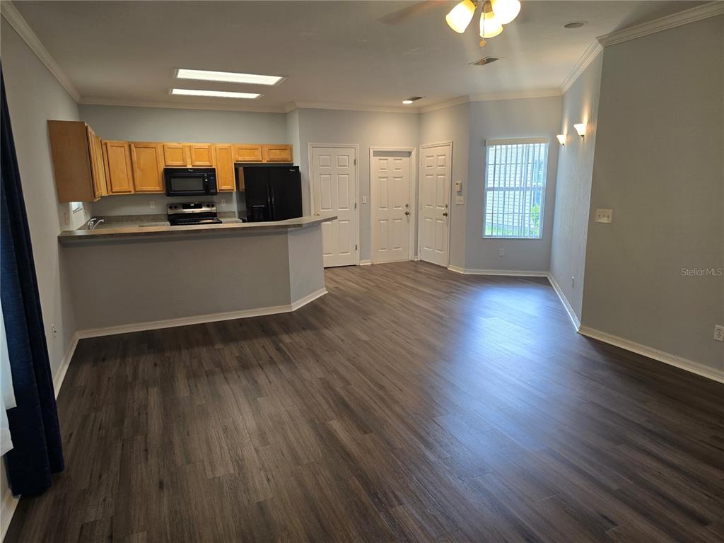 7976 48 Way Gainesville, FL 32653 - Photo 7 of 26 a view of a kitchen with a sink and an oven