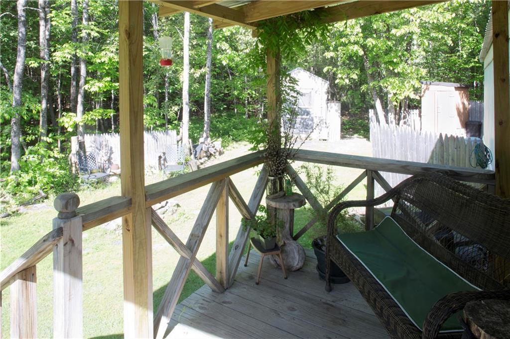 964 Main Road Carmel, ME 04419 - Photo 5 of 23 Covered back porch entrance