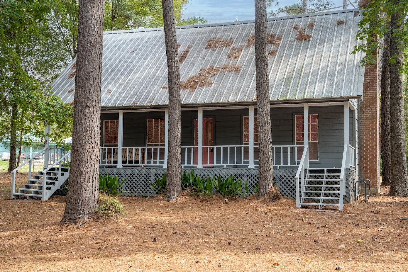 front view of a house with a yard