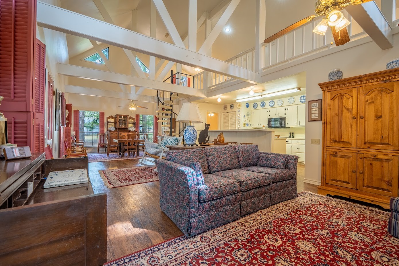 565 Timber Bay Drive Trinity, TX 75862 - Photo 17 of 49 a living room with furniture and a chandelier