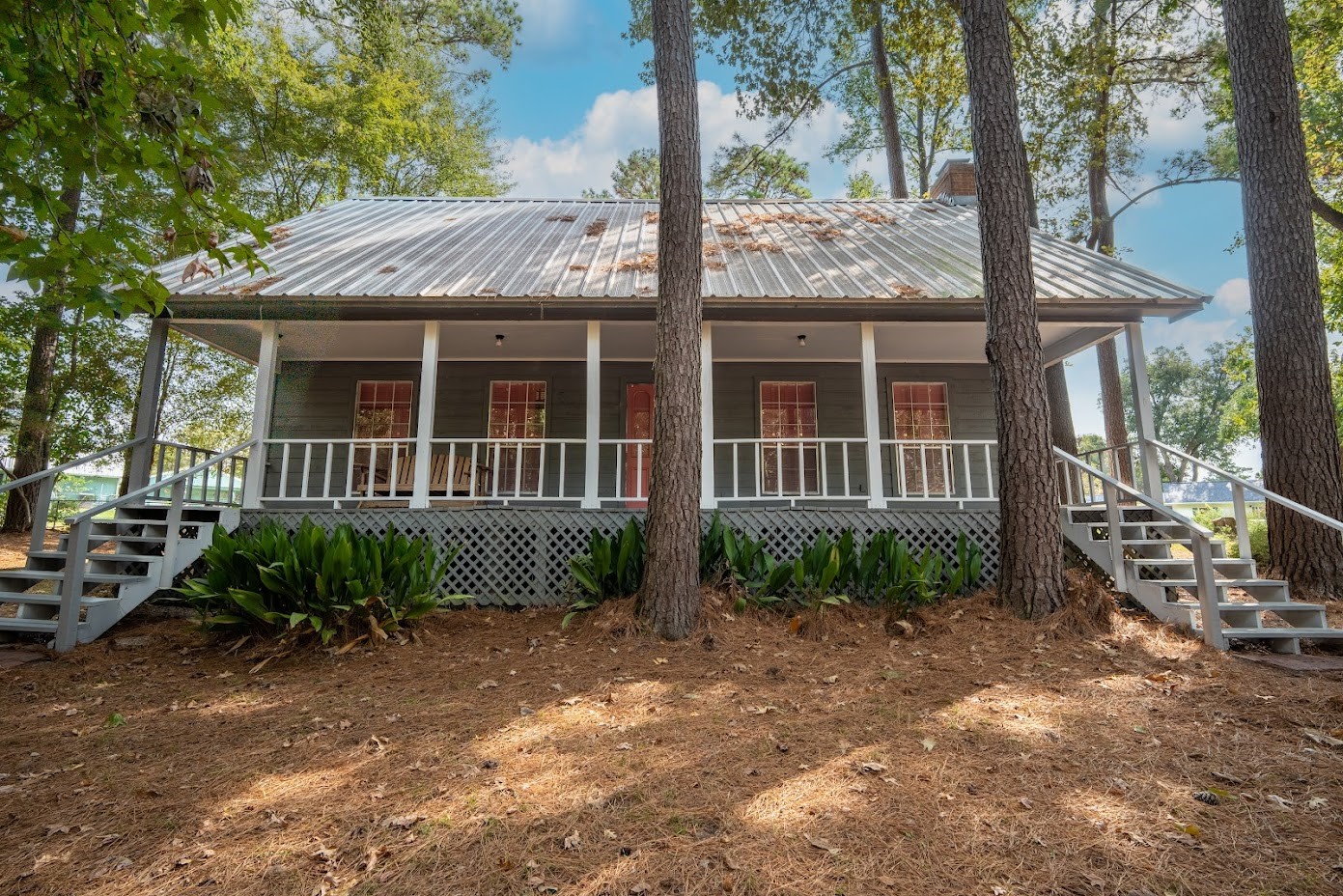 565 Timber Bay Drive Trinity, TX 75862 - Photo 2 of 49 front view of a house with a yard