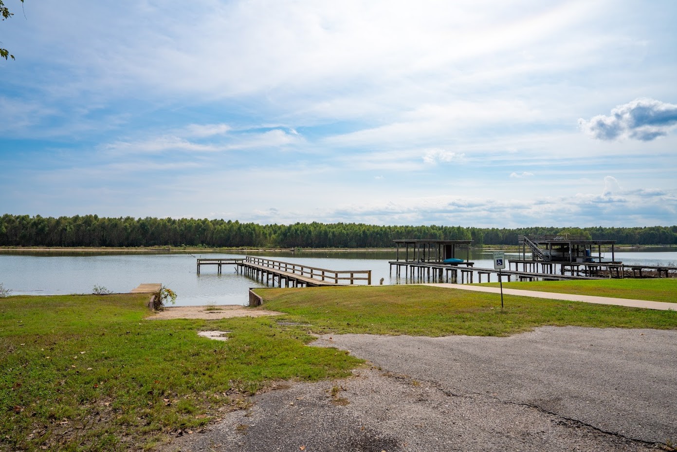 565 Timber Bay Drive Trinity, TX 75862 - Photo 42 of 49 a view of a lake with houses in the back