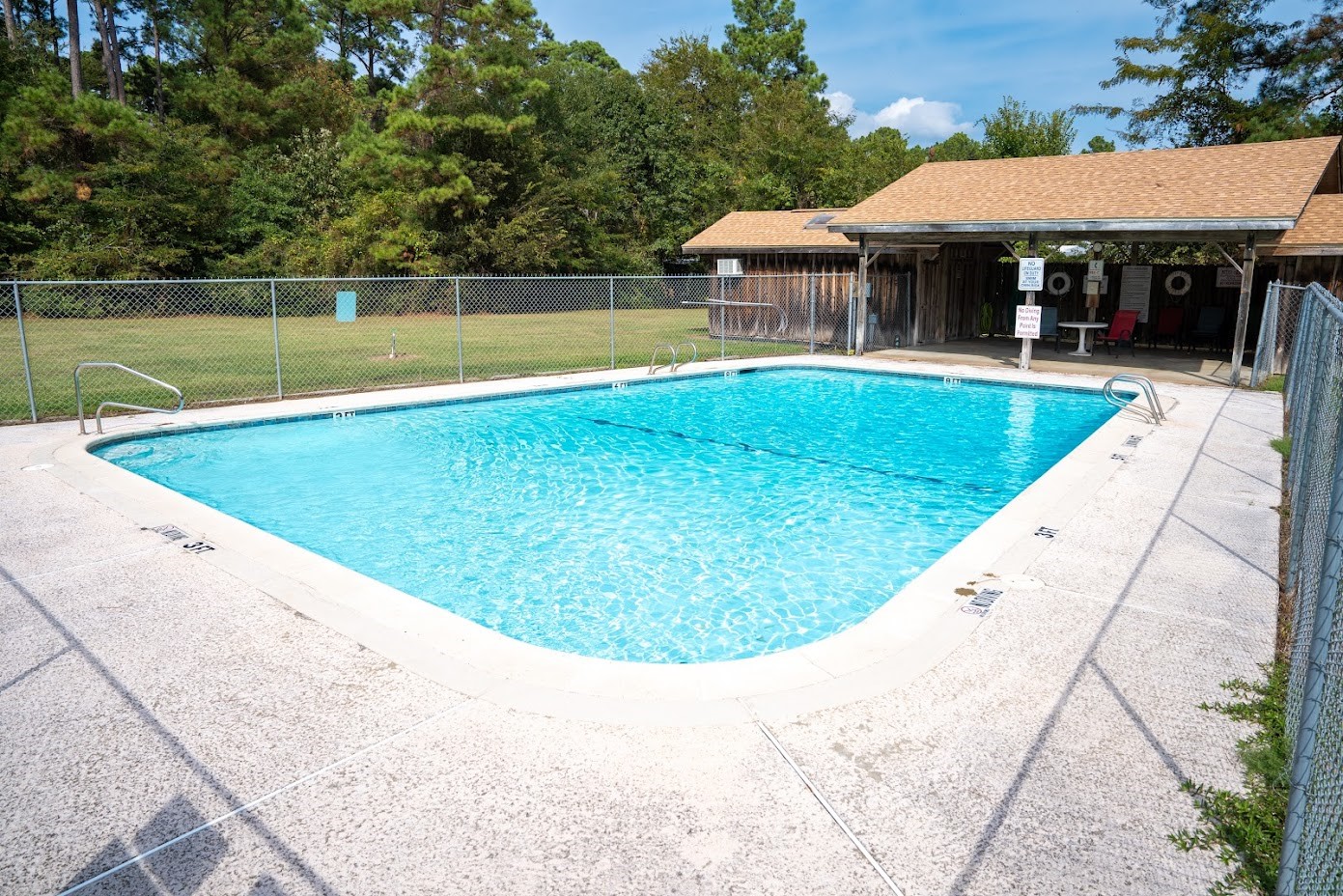 565 Timber Bay Drive Trinity, TX 75862 - Photo 46 of 49 a view of a swimming pool with a patio