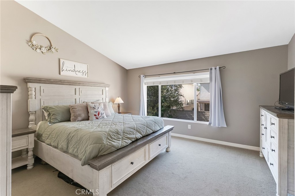 3843 San Gabriel Street Simi Valley, CA 93063 - Photo 32 of 52 a bedroom with a bed and a flat tv screen on the dresser