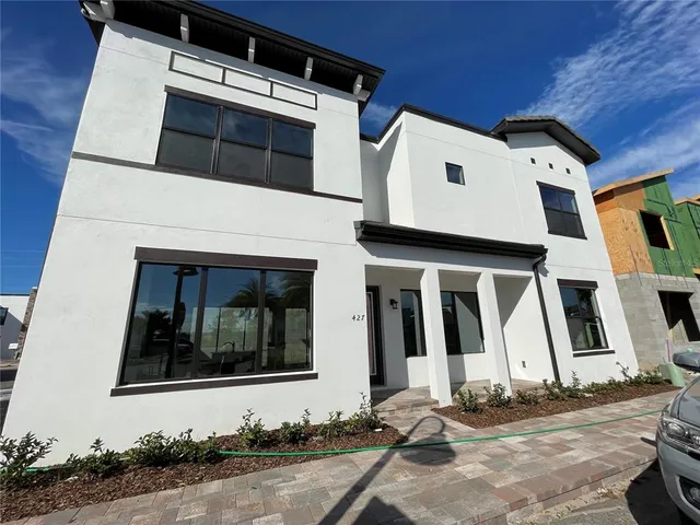 a view of an house with backyard porch and kitchen
