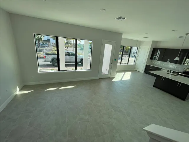 an empty room with windows