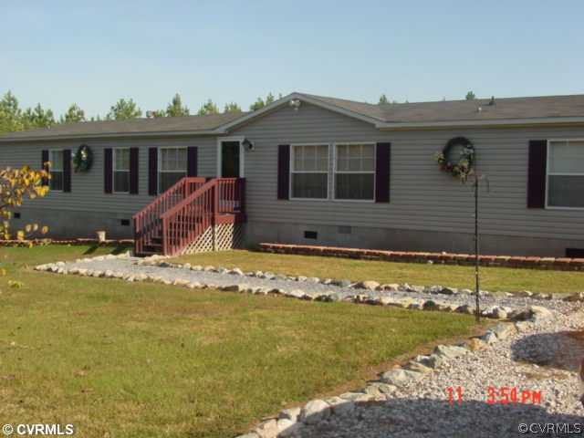 4601 Namozine Road Ford, VA 23850 - Photo 1 of 12 a view of a house with swimming pool and yard