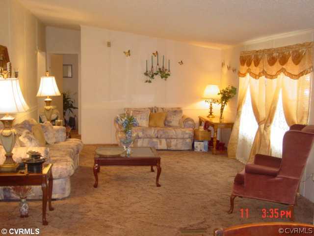 4601 Namozine Road Ford, VA 23850 - Photo 6 of 12 a living room with furniture and a couch