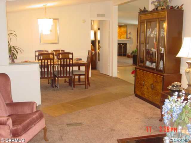 4601 Namozine Road Ford, VA 23850 - Photo 9 of 12 a view of a livingroom with furniture and a dining table