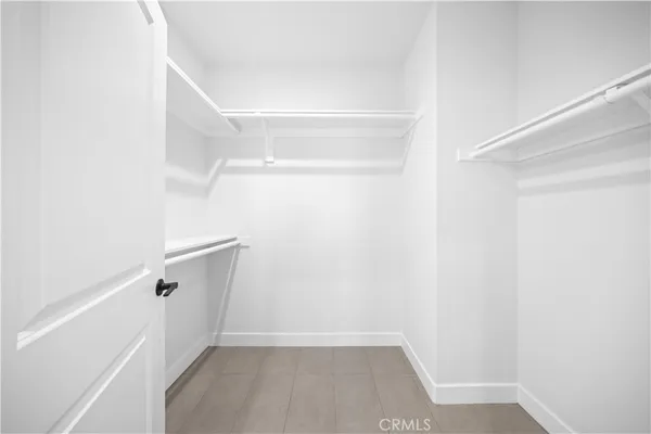 a view of an empty walk in closet