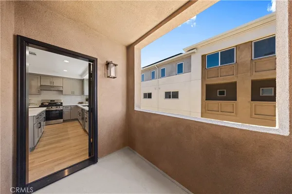 a view of a living room with a large window