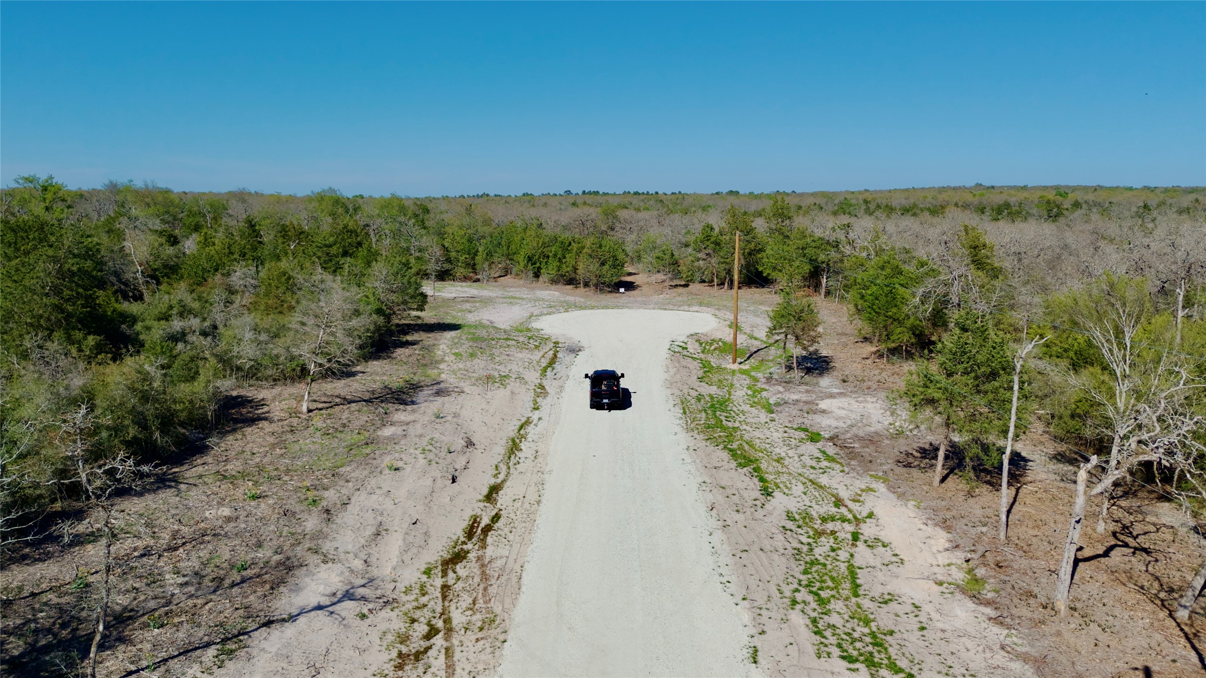 100 Pr 617 Roads Kosse, TX 76653 - Photo 14 of 26 View of dirt / gravel road featuring a rural view