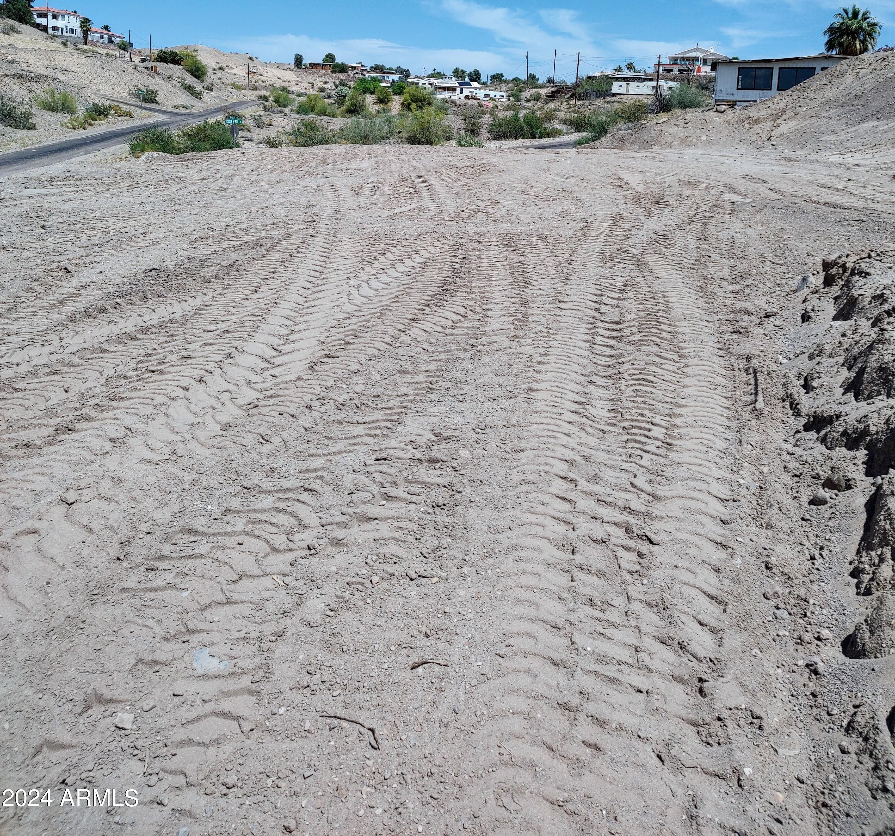 4530 Tanque Verde Drive, Unit 3 Topock, AZ 86436 - Photo 11 of 30 a view of a dry yard