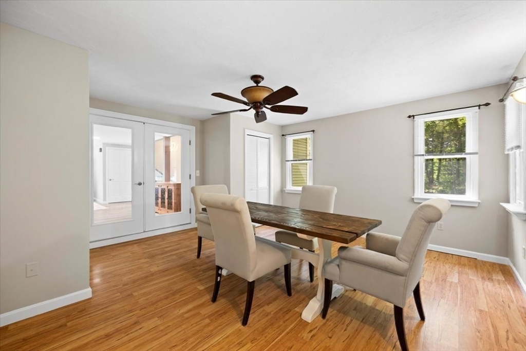 115 Douglas Road Webster, MA 01570 - Photo 17 of 42 a view of a dining room with furniture window and wooden floor