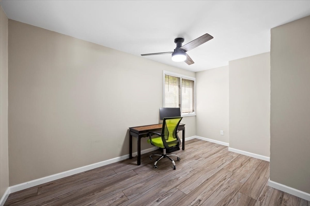 115 Douglas Road Webster, MA 01570 - Photo 20 of 42 a living room with furniture and a table