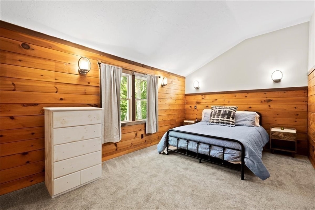 115 Douglas Road Webster, MA 01570 - Photo 29 of 42 a bedroom with a bed and a window