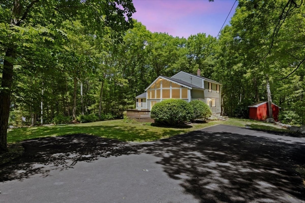 115 Douglas Road Webster, MA 01570 - Photo 3 of 42 a backyard of a house with lots of green space