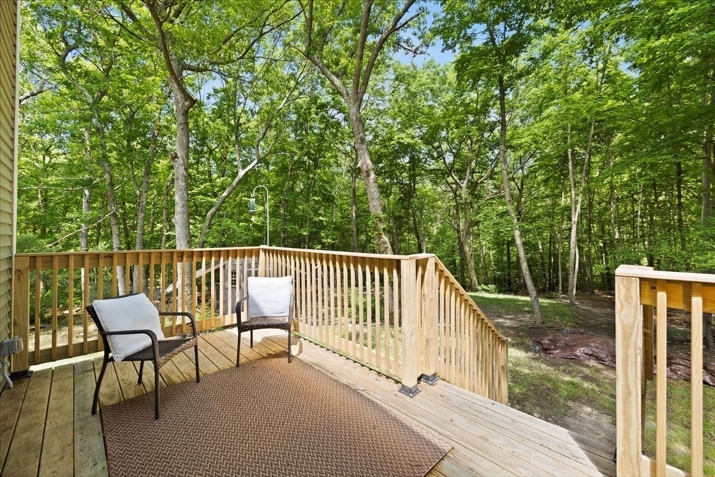 115 Douglas Road Webster, MA 01570 - Photo 38 of 42 a view of a chair and table in the balcony