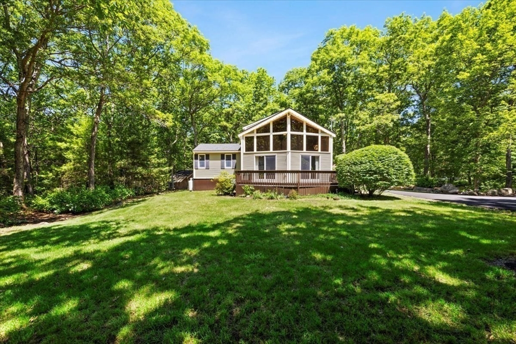 115 Douglas Road Webster, MA 01570 - Photo 6 of 42 a front view of a house with a yard