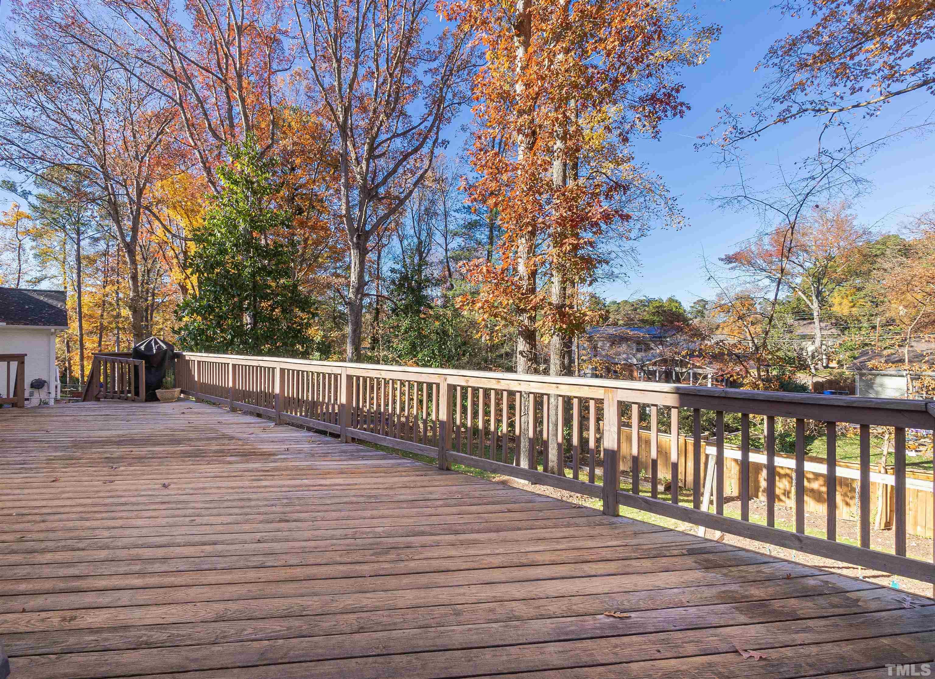 604 Davidson Street Raleigh, NC 27609 - Photo 22 of 28 a view of a wooden deck