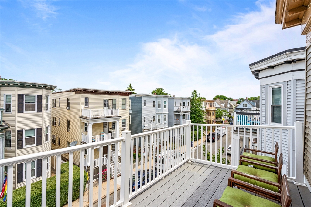 7 Hallam Street, Unit 3 Boston, MA 02125 - Photo 11 of 12 a view of a balcony with city view