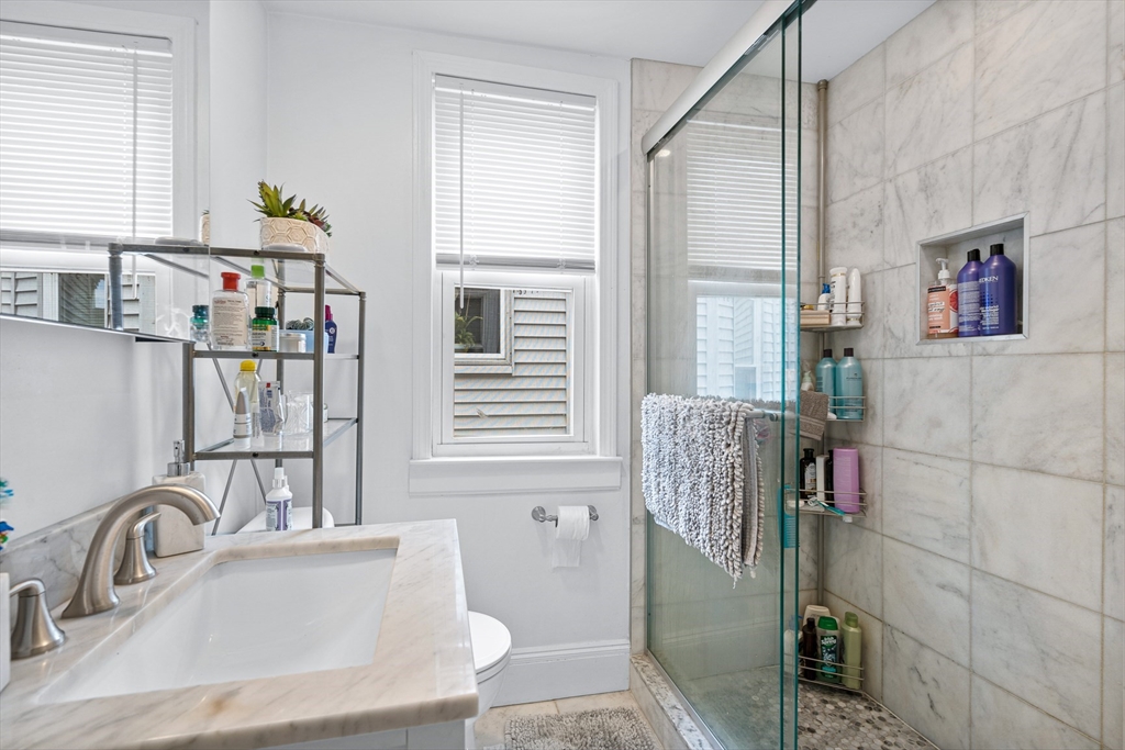 7 Hallam Street, Unit 3 Boston, MA 02125 - Photo 8 of 12 a bathroom with a sink and a window