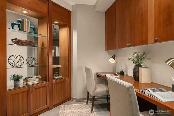 a stove top oven sitting inside of a kitchen