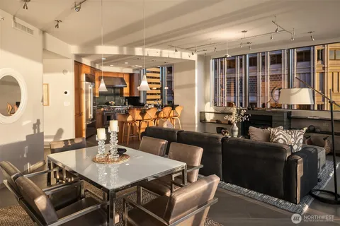 a view of a dining room with furniture window and outside view