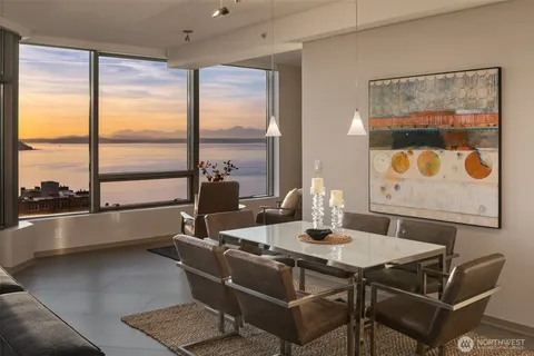 a dining room with large window