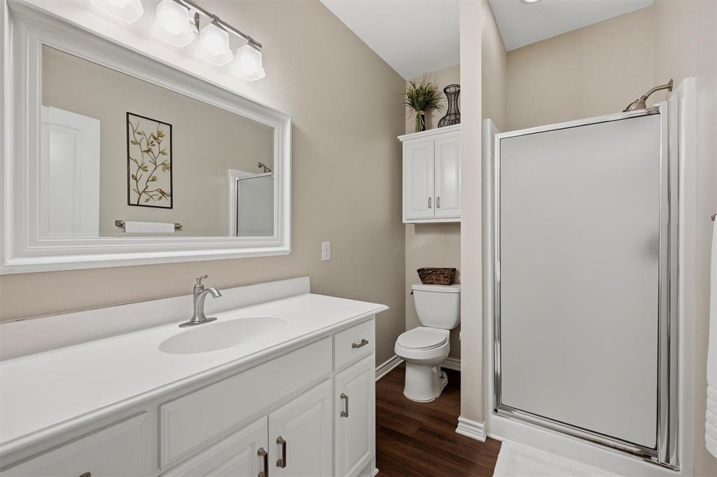 15656 South State Highway 78 Blue Ridge, TX 75424 - Photo 26 of 36 a bathroom with a sink toilet and shower