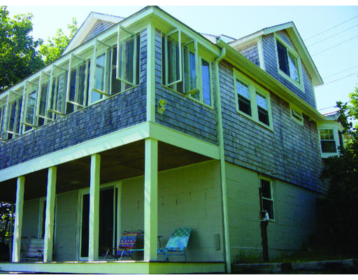 33 Edgewater Road Hull, MA 02045 - Photo 1 of 1 a front view of a house with balcony