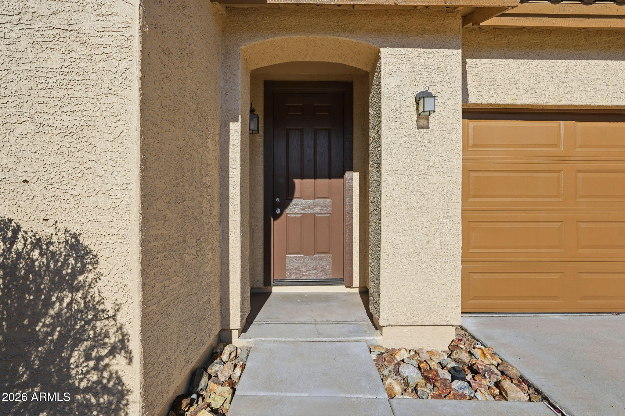 9360 West Payson Road Tolleson, AZ 85353 - Photo 4 of 33 a view of a entryway door front of house