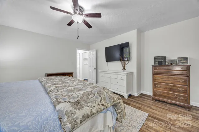 a bedroom with a bed and furniture