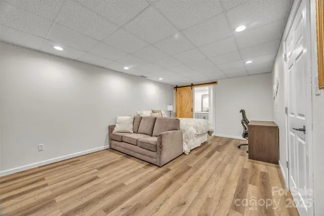 a bed room with a bed and a couch