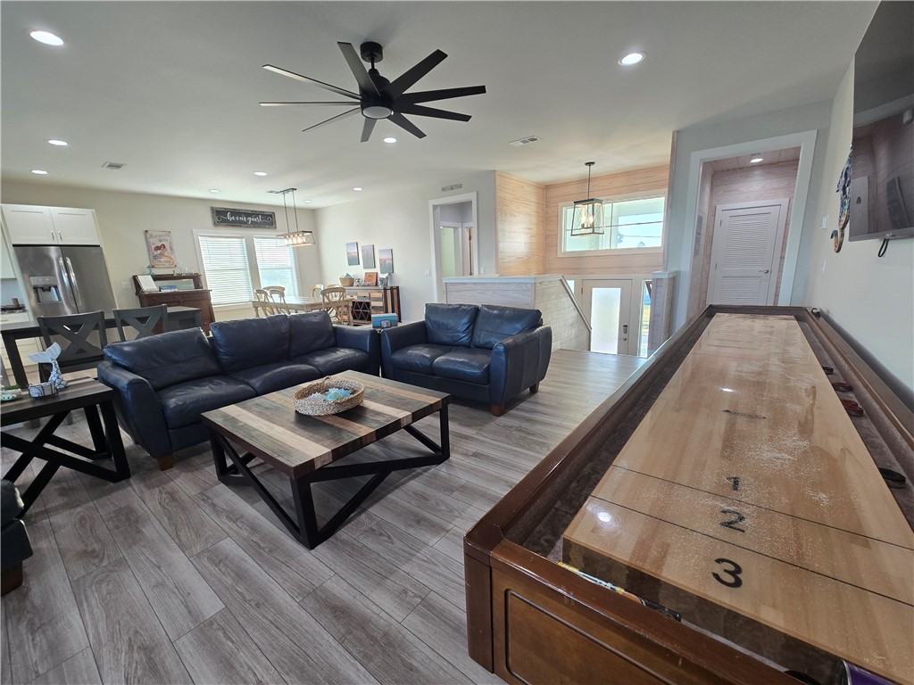 122 Ridge Harbor Drive Rockport, TX 78382 - Photo 14 of 34 a living room with furniture and a wooden floor