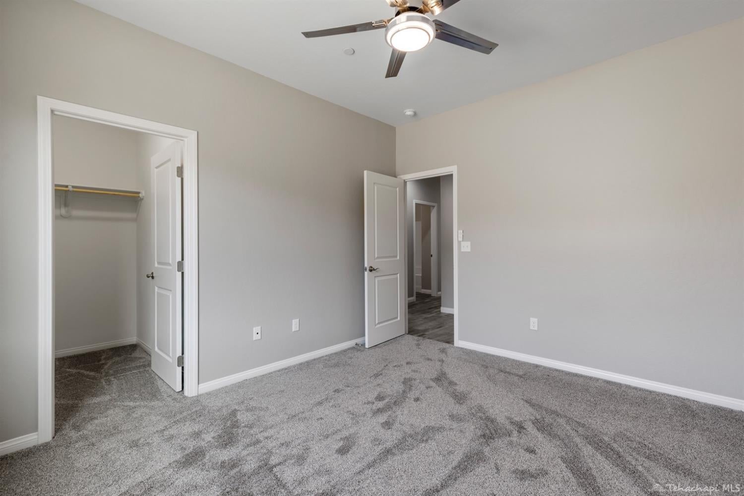22700 Mariposa Road Tehachapi, CA 93561 - Photo 19 of 42 master bedroom/walk-in closet