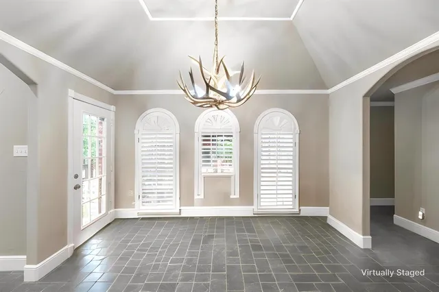 a view of a hallway with windows