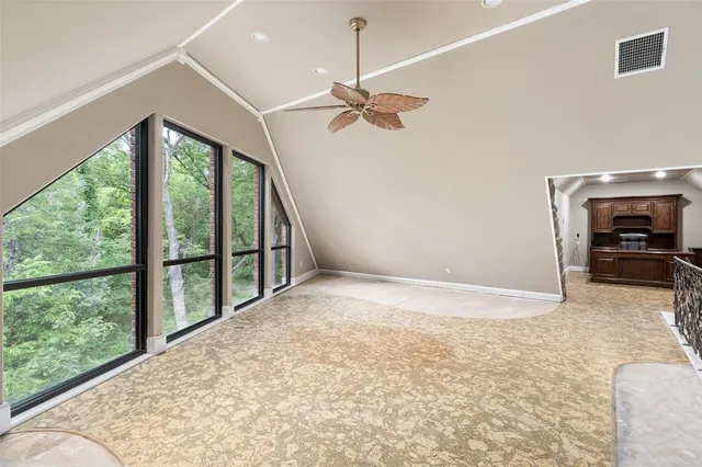 a view of a livingroom with a ceiling fan