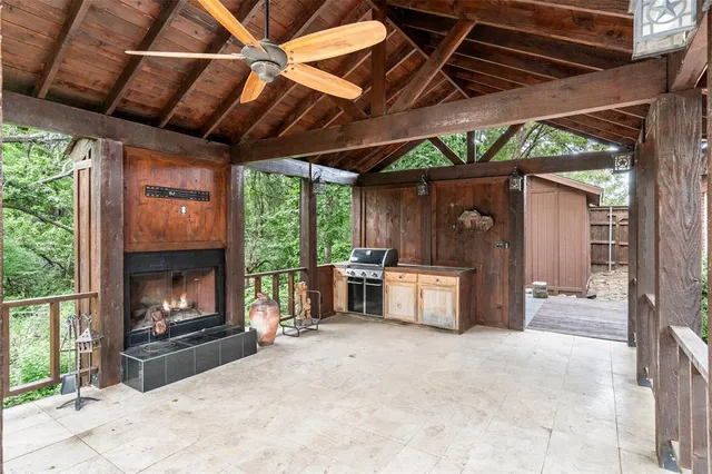 a view of outdoor space wooden floor and a fireplace