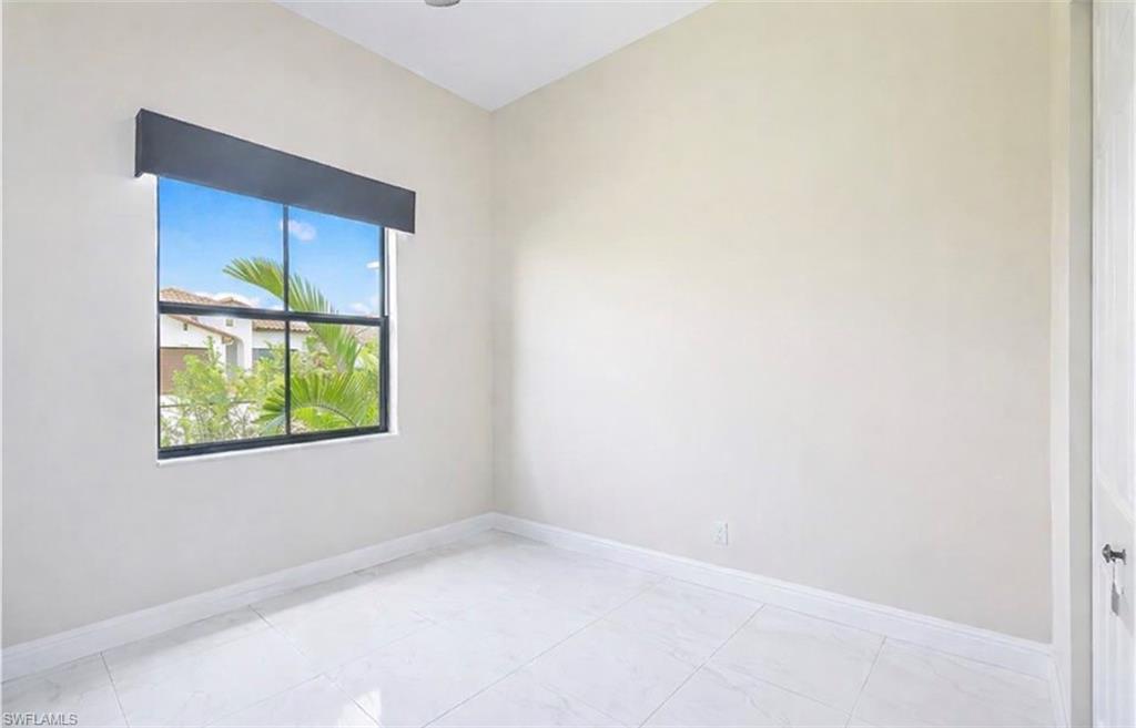 4761 Rosetta Terrace Ave Maria, FL 34142 - Photo 17 of 35 an empty room with a window