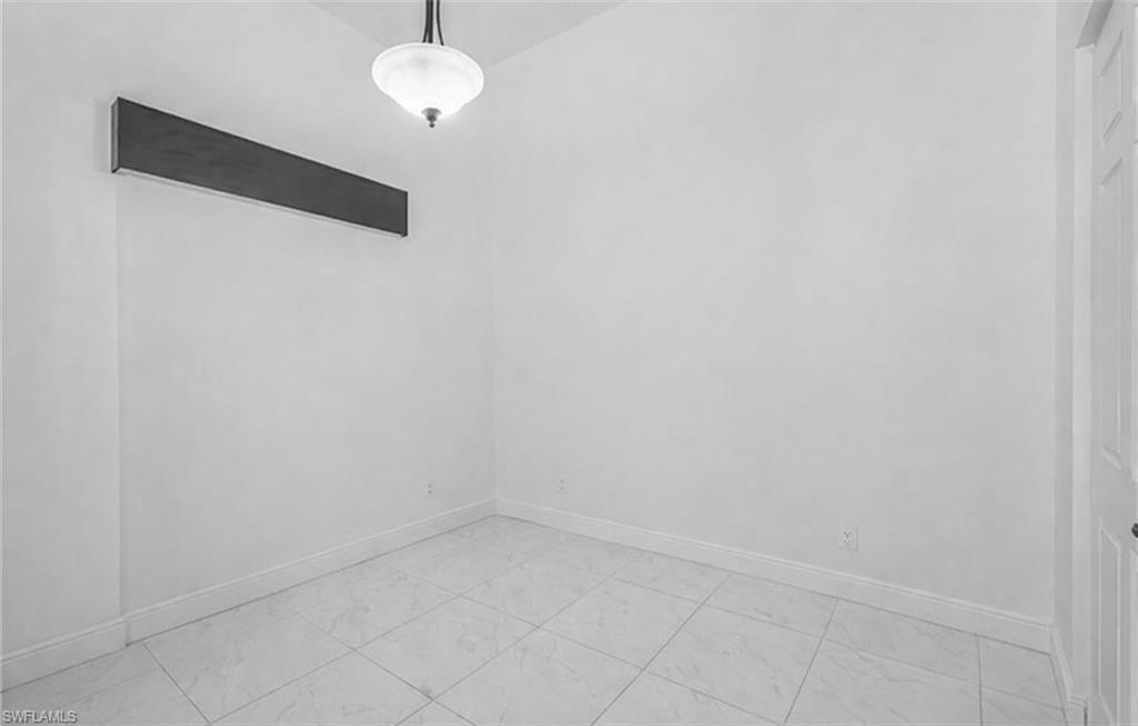 4761 Rosetta Terrace Ave Maria, FL 34142 - Photo 18 of 35 a view of a room with a fan