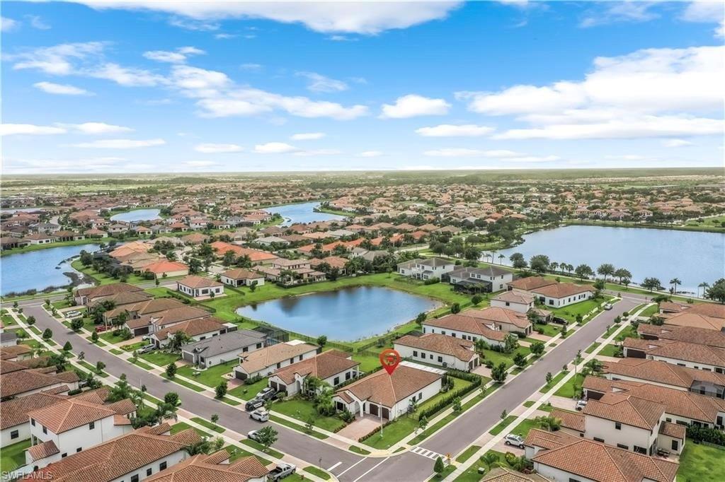 4761 Rosetta Terrace Ave Maria, FL 34142 - Photo 34 of 35 an aerial view of city and lake