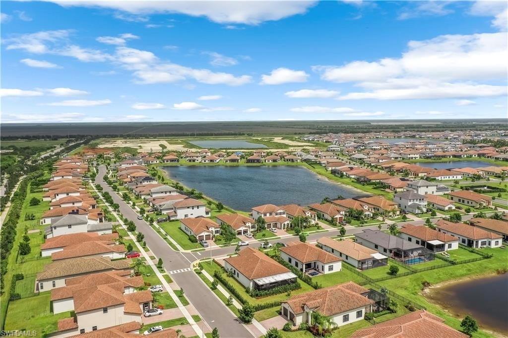 4761 Rosetta Terrace Ave Maria, FL 34142 - Photo 35 of 35 an aerial view of residential building and lake