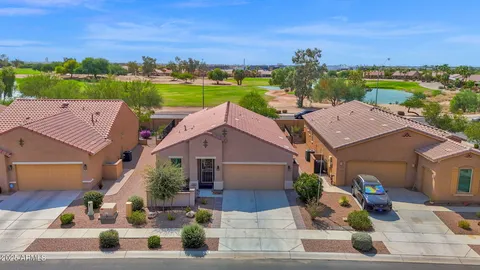 an aerial view of a house with a garden view