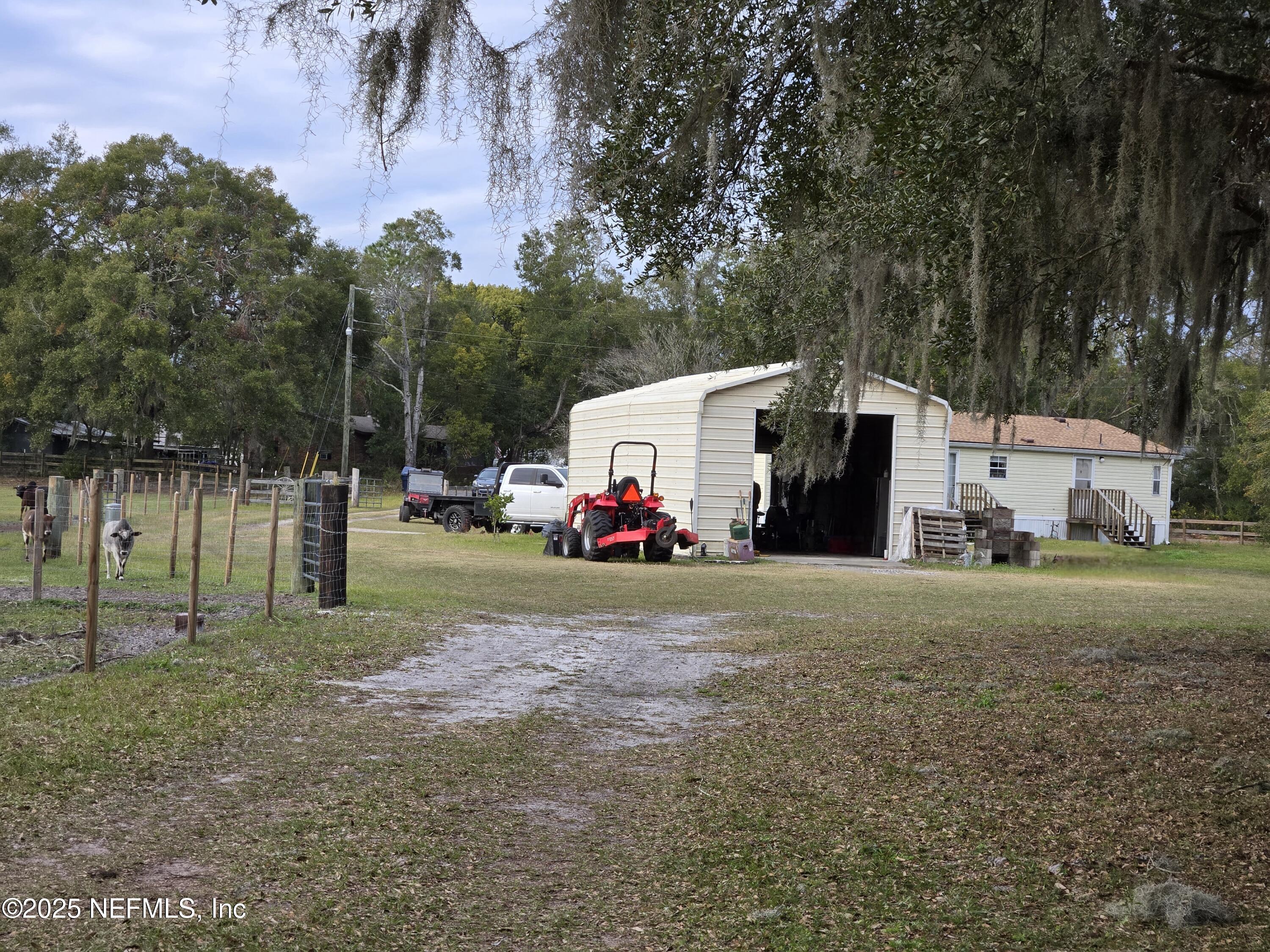 85050 Myrtice Road Yulee, FL 32097 - Photo 48 of 87 a view of a house with backyard